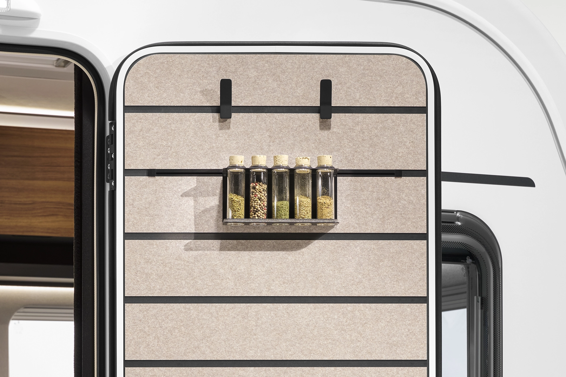 The multifunctional rails in the door even add the necessary spice to your vacation.